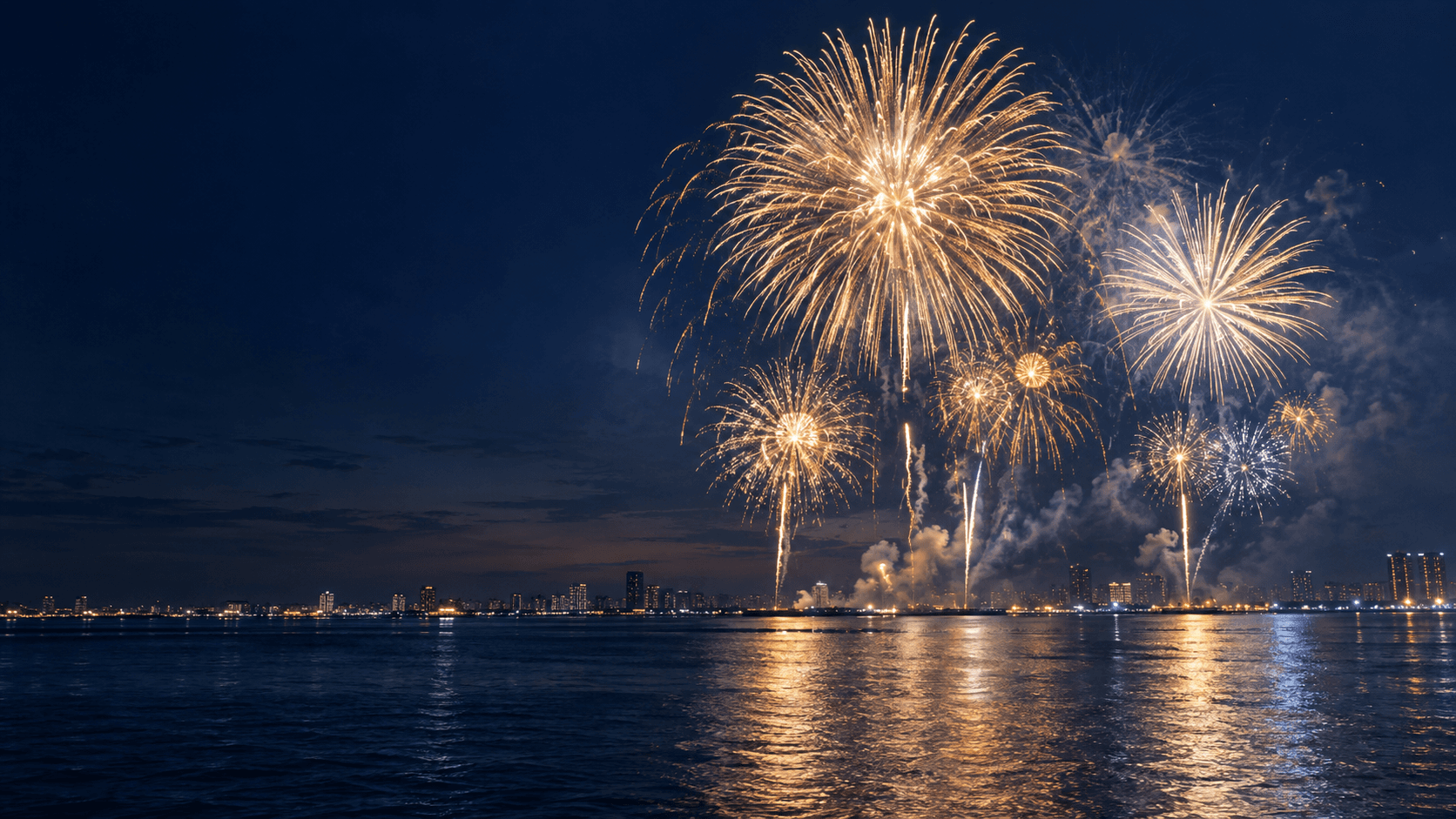 東京湾を望む夜空に花火が上がるイメージ